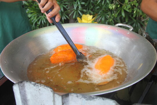 Phiiippines empenada deep frying in a wok
