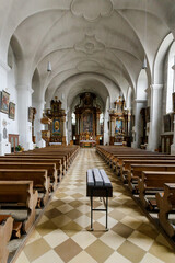 Fototapeta na wymiar Empty church interior with wooden pews