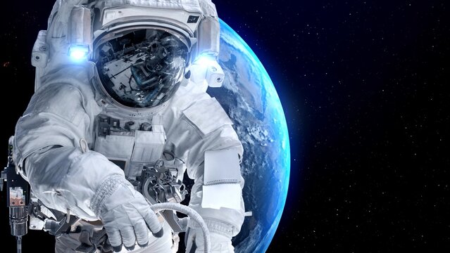 Astronaut spaceman do spacewalk while working for spaceflight mission at space station . Astronaut wear full spacesuit for operation . Elements of this image furnished by NASA space astronaut photos .