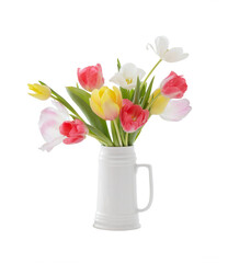 beautiful   tulips in white jug isolated on white background
