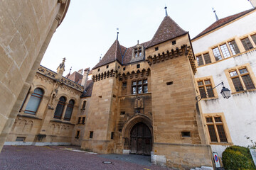 Fototapeta na wymiar Medieval gated stone entrance to a town square