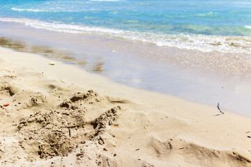 Trampled sand on a tropical beach