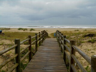Small wooden walkway leading to the beach, Laguna, SC, Brazil