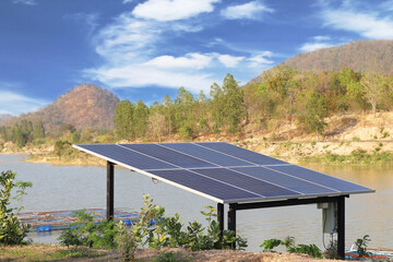 Solar panels for pumping water supply beside the reservoir in ru