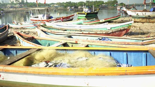 Fishing boat parked at Versova beach, Mumbai, India