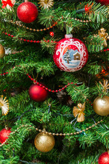 Christmas decorations hanging on a tree