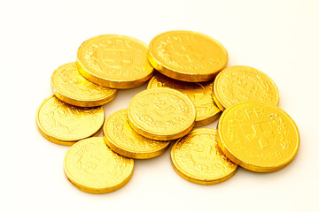 Pile of gold foil wrapped chocolates