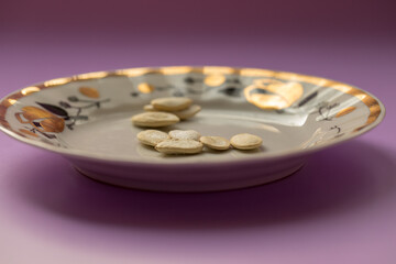 a few pumpkin seeds on a plate