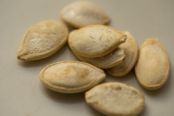 pumpkin seeds a few pieces on the table