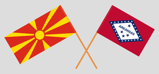 Crossed flags of North Macedonia and The State of Arkansas. Official colors. Correct proportion