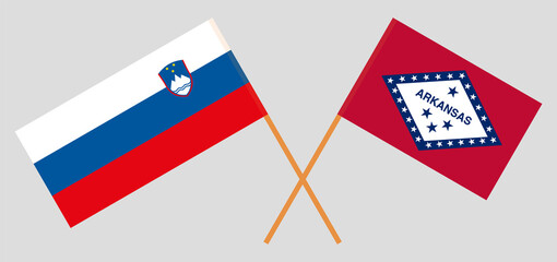 Crossed flags of Slovenia and The State of Arkansas. Official colors. Correct proportion