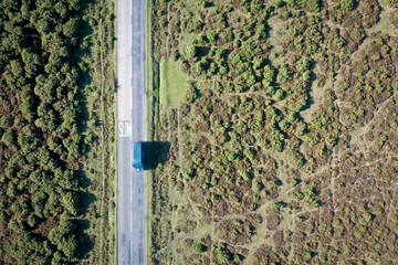 Aerial photo of van on a road in heathland