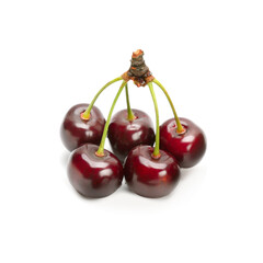 Ripe cherries isolated on white background.