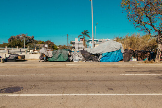 Homelessness in California, furniture and tents on the streets of Los Angeles.