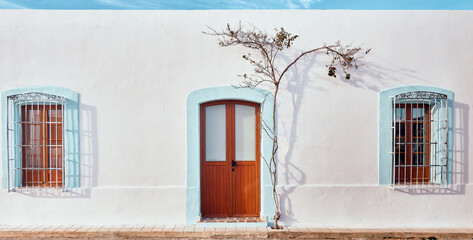 Walking the streets of a town of white houses