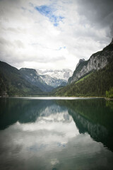 Fototapeta na wymiar View of the Austria nature - high alpine and lakes in valley. Summer nature with green colors.