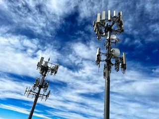 Cell towers with dramatic sky