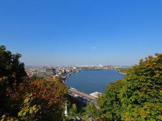 Beautiful panoramic view of the left bank of the Dnieper in the capital of Ukraine in Kyiv.