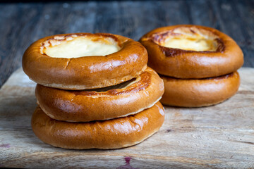 sweet dough pastries with sour cream and milk filling