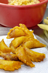 Fried empanada with corn base on its cover. Typical Colombian food, South America. Close up.