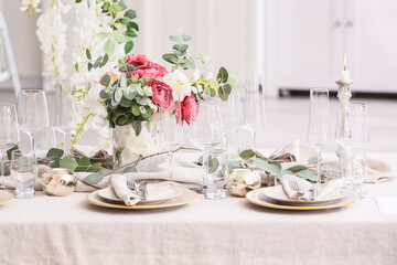 Stylish table setting for wedding celebration