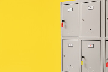 Modern locker near yellow wall