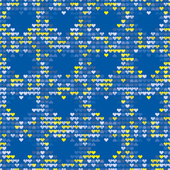 Abstract Seamless vector pattern with layered hearts on blue background. Shades of blue and yellow including Ukrainian national colours. Support for Ukraine.