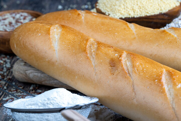 pieces of wheat baguette on a cutting board
