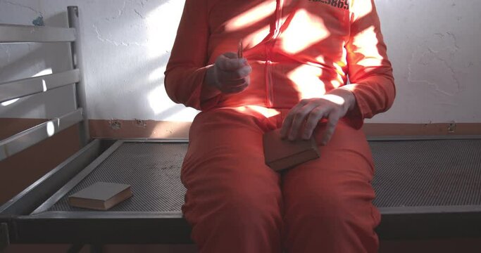Handmade weapon in the hands of a prisoner.