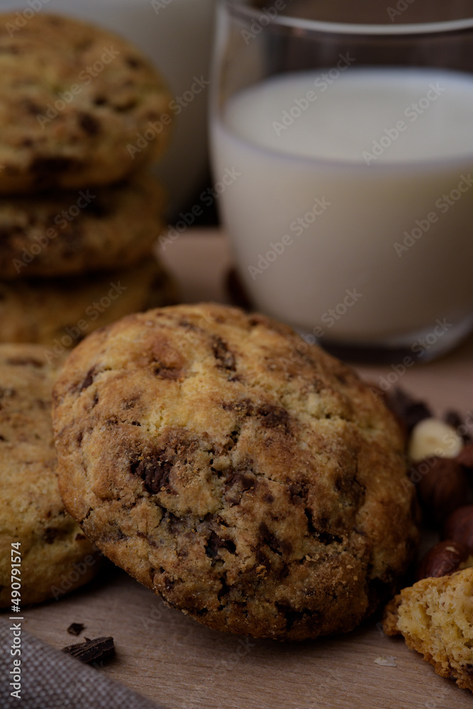 Sticker Vertical shot of tasty chocolate chip cookies and milk