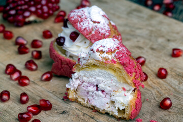 red cranberry-flavored cake with cranberry berries and creamy milk filling