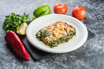 Casserole with cheese and spinach