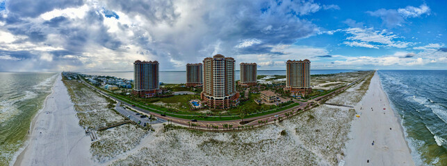 Panoramic aerial view of the beautiful beach and the buildings in Pensacola Beach, Florida, US