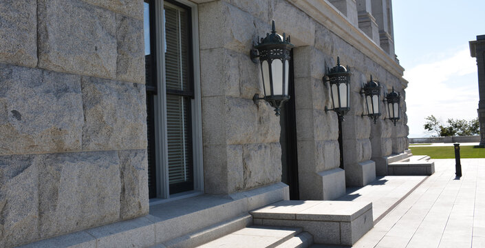 Street lamps on the wall at daytime