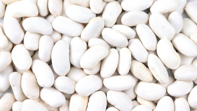 White Beans texture background rotation. Vegetarian food.Kidney beans.Haricot beans