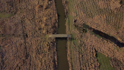 Zelfklevend Fotobehang Aerial view of a river in Denmark © Drone Shots Denmark/Wirestock