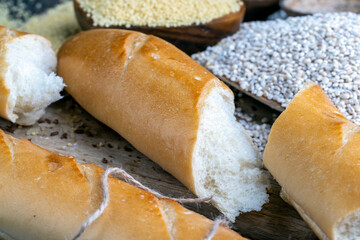 pieces of wheat baguette on a cutting board