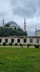 Fototapeta na wymiar Beyazit Mosque in Istanbul. Courtyard of the mosque. Ottoman mosque architecture.