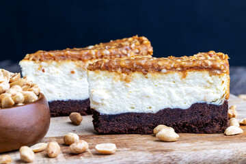 creamy chocolate cake with caramel and roasted peanuts