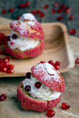 red cranberry-flavored cake with cranberry berries and creamy milk filling