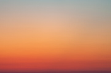 Tranquil background of red and orange gradient sky - obrazy, fototapety, plakaty