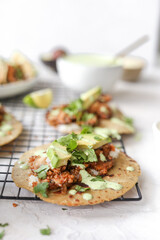 mushroom chipotle tacos with avocado crema