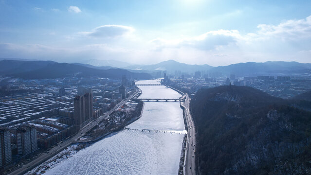 Aerial shot of a cityscape with Rungra Bridge in Pyongyang, North Korea,