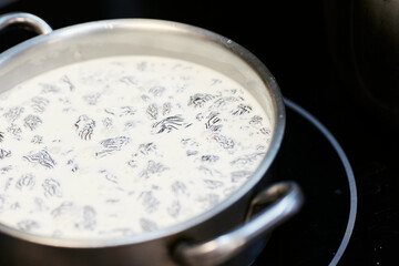 the process of boiling morel mushrooms in milk