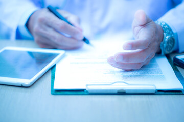 person analyzing financial figures
