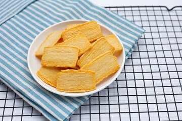 Cheese crispies on white plate