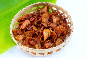 Banana slice chips in bamboo basket