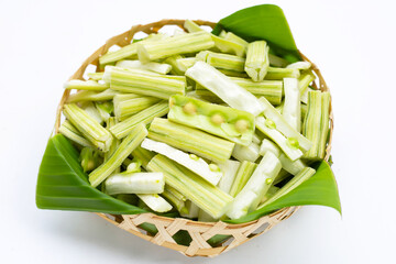 Moringa oleifera cut in pieces in bamboo basket