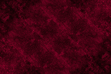 Abstract grunge textured dark red color concrete wall surface for background