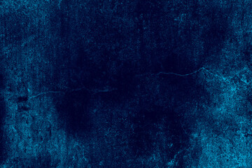 Dark blue color cracked old concrete wall with heavy grunge texture for background